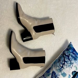 Cream and black color boots, size 7